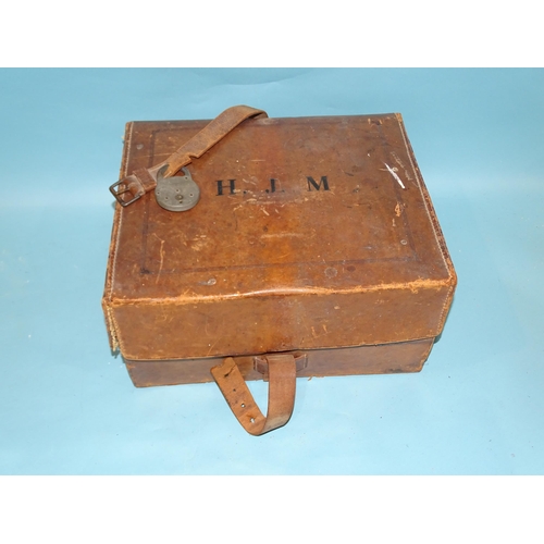 152 - A leather-bound travelling writing box with fitted interior, within a leather outer case, 38 x 32cm,... 