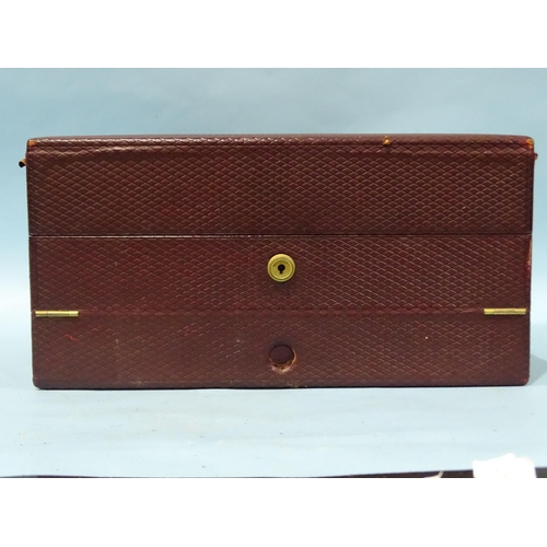 152 - A leather-bound travelling writing box with fitted interior, within a leather outer case, 38 x 32cm,... 