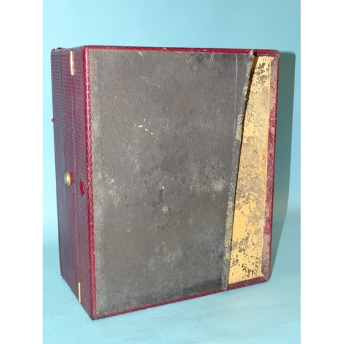 152 - A leather-bound travelling writing box with fitted interior, within a leather outer case, 38 x 32cm,... 