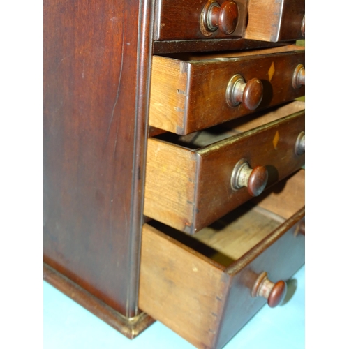 154 - A mahogany miniature chest of two short and three long drawers, 37cm wide, 40cm high.... 