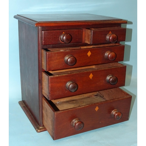 154 - A mahogany miniature chest of two short and three long drawers, 37cm wide, 40cm high.... 