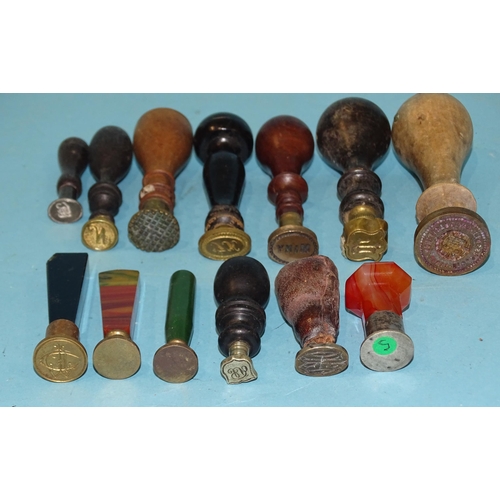 158 - A collection of thirteen various desk stamp seals, including wooden and agate examples, (13).... 