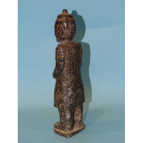 163 - A carved stone figure of a Chinese warrior in the style of a Terracotta Army figure, 25cm high.... 