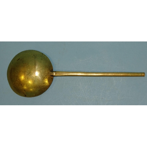 173 - A 17th century brass spoon with indistinct stamp mark, 22.5cm long, 7.5cm diameter, together with a ... 