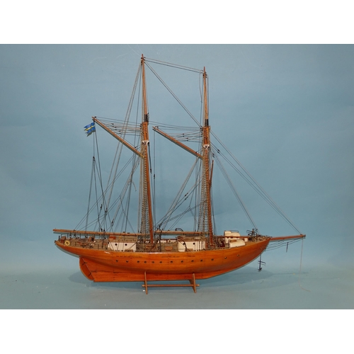 175 - A scratch-built model of a two-masted ketch rig boat, the planked hull with rigging and deck details... 