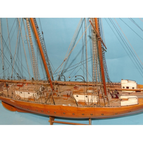 175 - A scratch-built model of a two-masted ketch rig boat, the planked hull with rigging and deck details... 