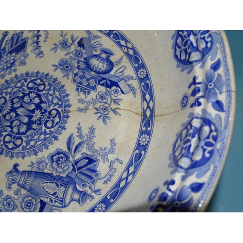 199 - A collection of late-19th century Spode blue and white dinner ware decorated with vases and flowers,... 