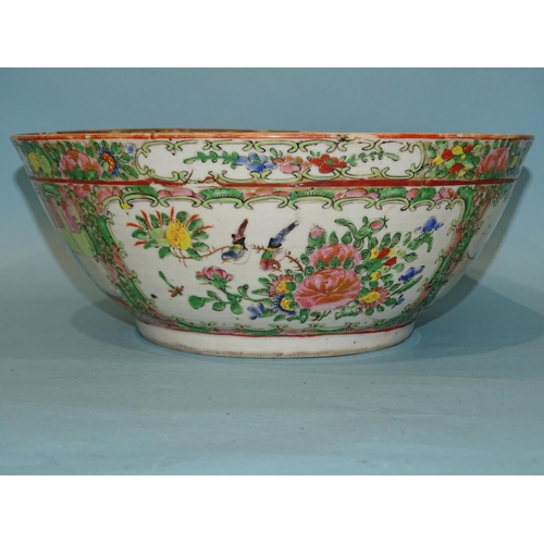 206 - A 19th century Canton bowl, typically-decorated with panels of figures, birds and flowers, 26cm diam... 