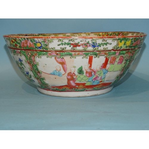 206 - A 19th century Canton bowl, typically-decorated with panels of figures, birds and flowers, 26cm diam... 