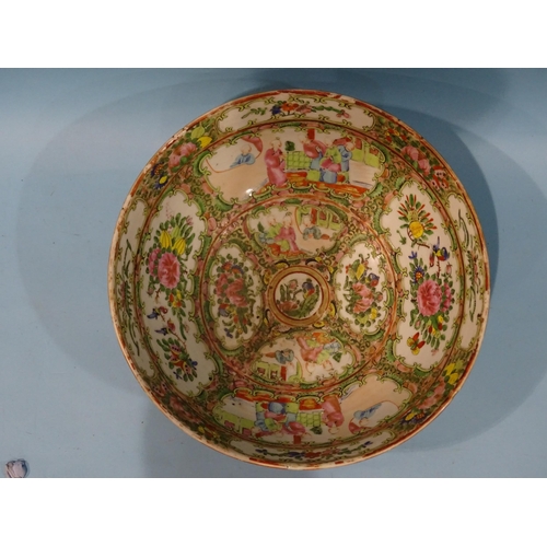 206 - A 19th century Canton bowl, typically-decorated with panels of figures, birds and flowers, 26cm diam... 