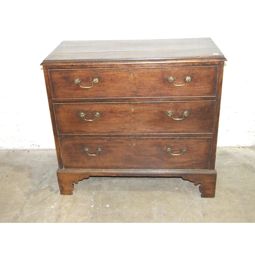 66 - An antique oak chest of three long drawers, on bracket feet, 95cm wide, 88cm high, 46cm deep.... 