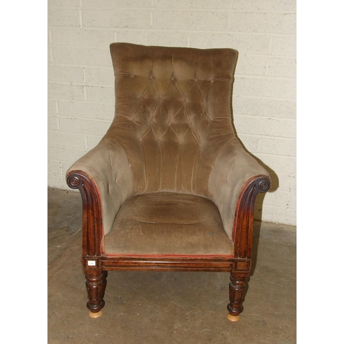 68 - A William IV button-back upholstered library chair with short carved front legs, (castors lacking), ... 