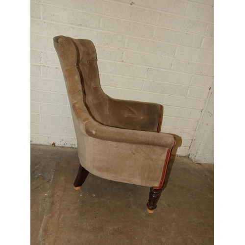 68 - A William IV button-back upholstered library chair with short carved front legs, (castors lacking), ... 