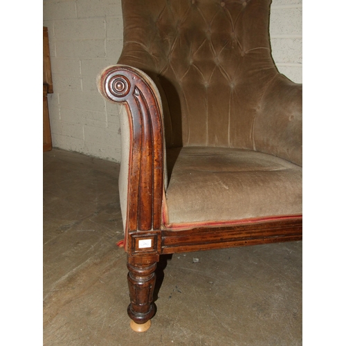 68 - A William IV button-back upholstered library chair with short carved front legs, (castors lacking), ... 