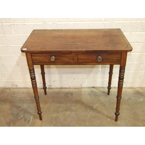 76 - A George IV ebony inlaid mahogany two-drawer side table on ring-turned legs, 82cm wide, 48cm deep, 7... 