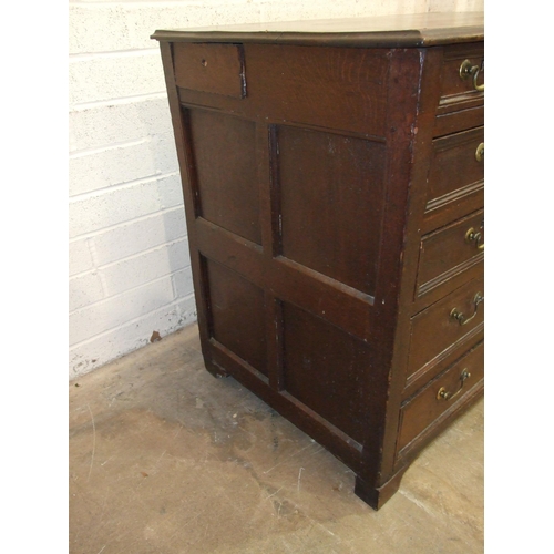 83 - An antique oak rectangular chest having an arrangement of eleven small drawers of varying size, 108c... 