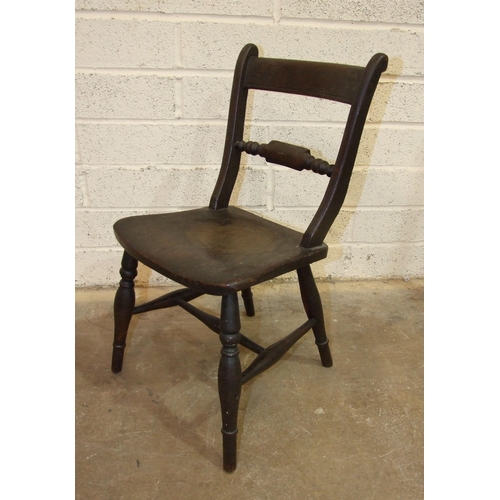 87 - A child's stained wood chair, the back with central turned bar, on solid seat with turned legs, 64cm... 