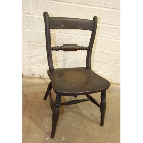 87 - A child's stained wood chair, the back with central turned bar, on solid seat with turned legs, 64cm... 