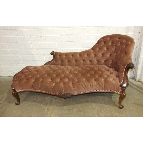 91 - A Victorian rosewood single-ended chaise longue, the carved frame, upholstered button-back and serpe... 