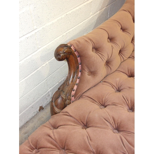 91 - A Victorian rosewood single-ended chaise longue, the carved frame, upholstered button-back and serpe... 