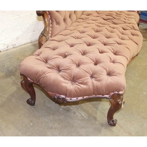 91 - A Victorian rosewood single-ended chaise longue, the carved frame, upholstered button-back and serpe... 