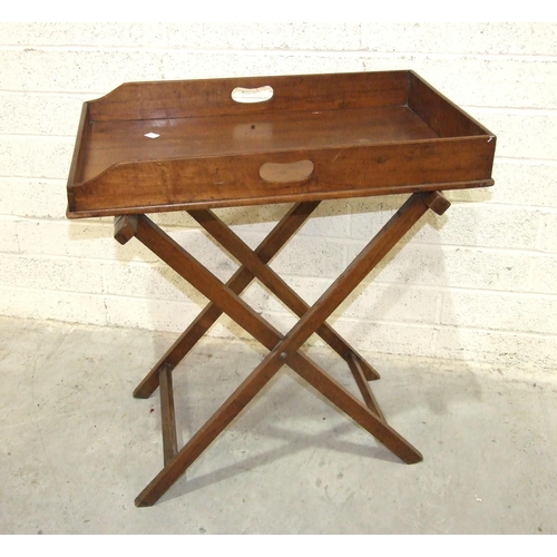 74 - A 19th century walnut butler's tray with folding stand and a low window seat/bench on turned legs, 9... 