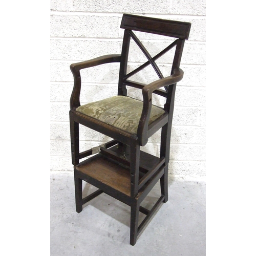 94 - A Georgian mahogany child's high chair with open back and drop-in seat, on square tapered legs to th... 