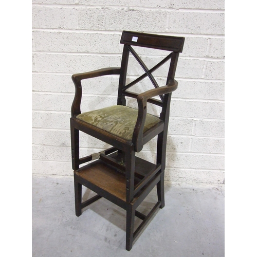 94 - A Georgian mahogany child's high chair with open back and drop-in seat, on square tapered legs to th... 