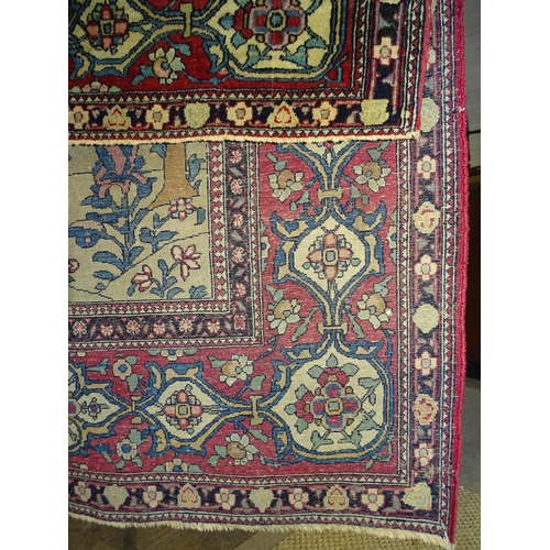 181 - An early-20th century Kashan design rug, decorated with tree of life pattern within triple red borde... 