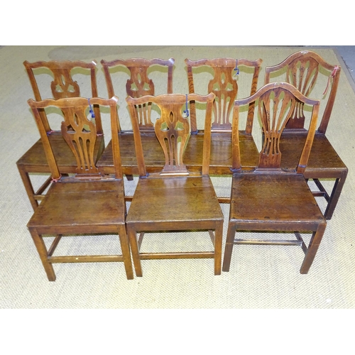 73 - A harlequin set of seven oak country Chippendale-style dining chairs, (7).