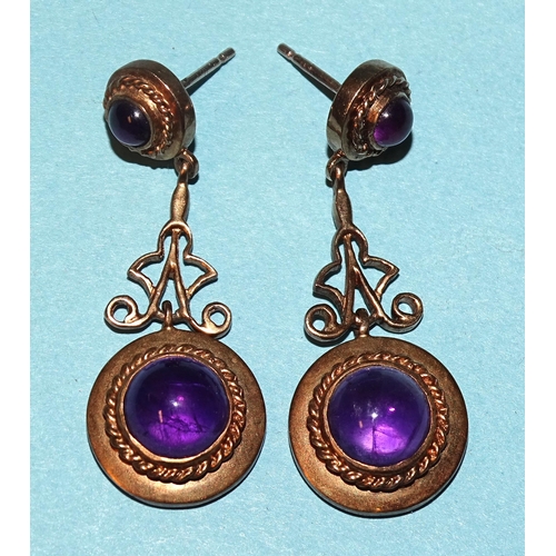 121 - A pair of 9ct gold amethyst ear drops, each with round amethyst cabochon, in rope-twist mount, on op... 