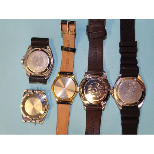 327 - A Citizen Automatic WR100 wrist watch, two other Citizen wrist watches, a Seiko 5 wrist watch with S... 