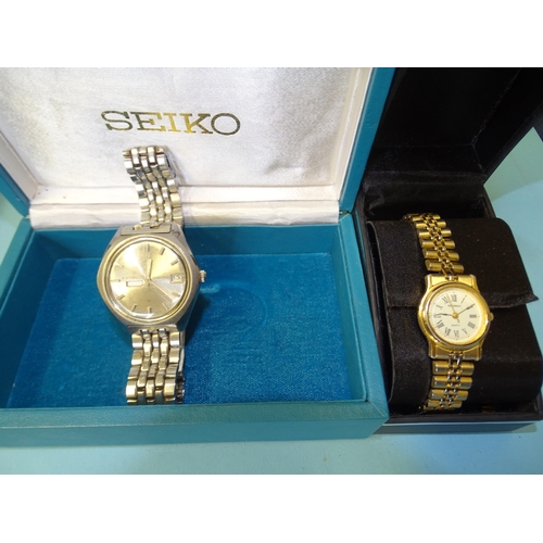 328 - Two Seiko Skyliner open-face pocket watches with gold-plated cases and watch chains, (both boxed) an... 