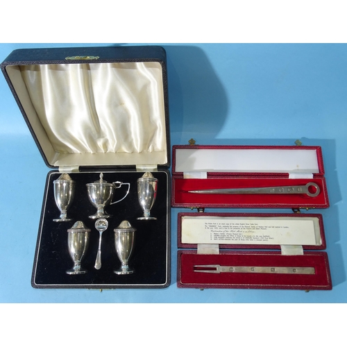 482 - A five-piece silver cruet set, Birmingham 1939, in case, total weight ___6oz, a modern cased silver ... 