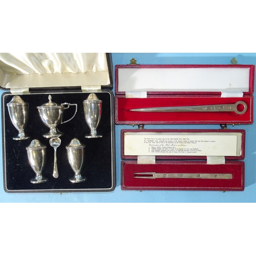 482 - A five-piece silver cruet set, Birmingham 1939, in case, total weight ___6oz, a modern cased silver ... 