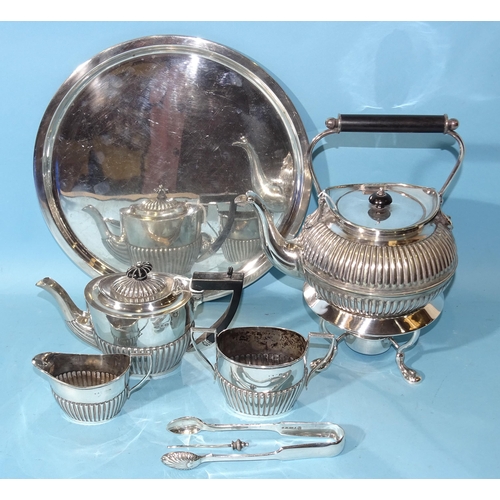 491 - An Edwardian silver bachelor's tea service with gadrooned decoration, William Henry Leather, Birming... 