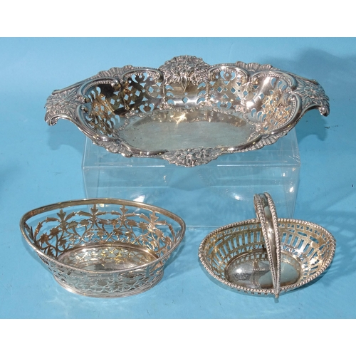 503 - An Edwardian silver embossed and pierced shaped oval bonbon dish, 19 x 10.5cm, Birmingham 1903, a sm... 