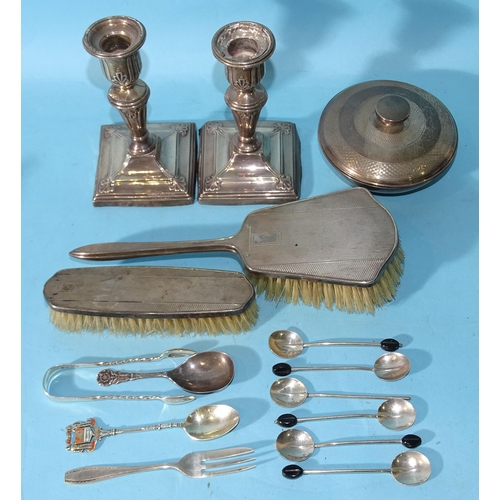 504 - A silver-backed hair brush and clothes brush, Birmingham 1920, a silver dressing table bowl and cove... 