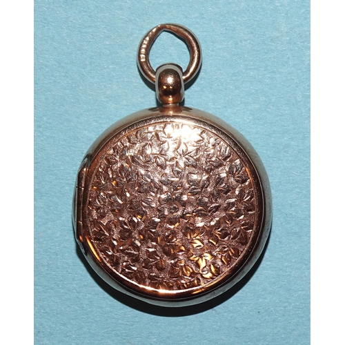 65 - A 9ct gold circular double-sided locket, 23mm, gross weight 8.3g.