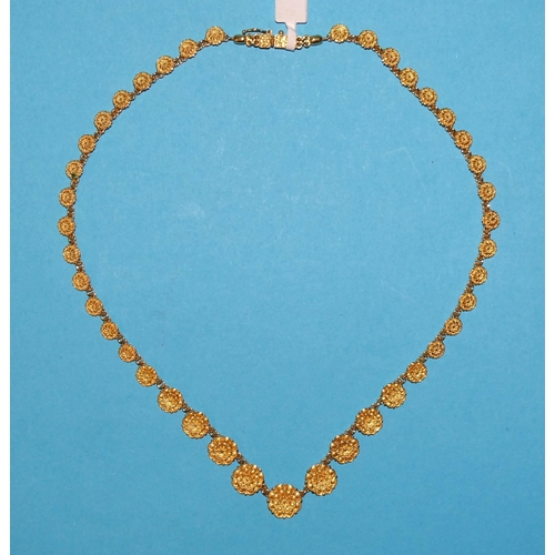 97 - A foreign gold necklace of graduated rosettes and a pair of matching earrings, all marked 18k, 33.3g... 