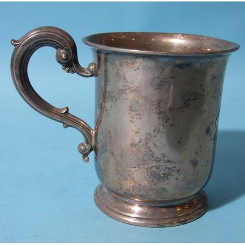 523 - A small plain tankard by E&J Barnard, with scroll handle, on circular foot, inscribed with initi... 