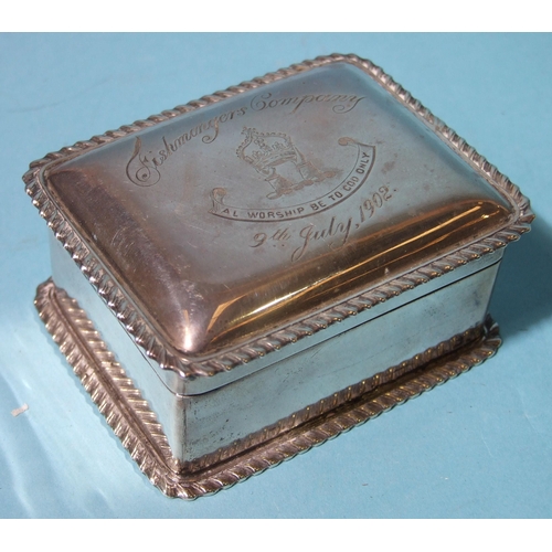 525 - A rectangular lidded box with gadrooned borders, engraved for Fishmongers Company, by Mappin Brother... 