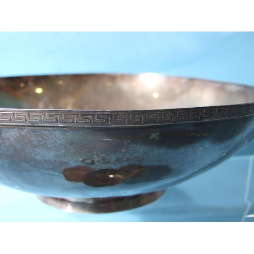 529 - A modern beaten-silver bowl with Greek key rim and foot rim, Edinburgh 2000, maker's mark G.H.W for ... 