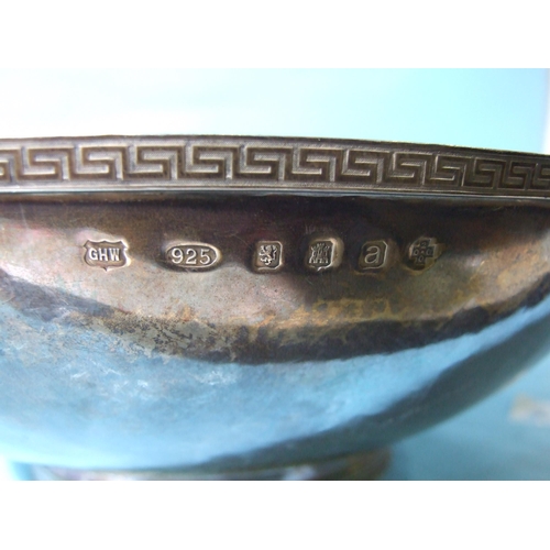 529 - A modern beaten-silver bowl with Greek key rim and foot rim, Edinburgh 2000, maker's mark G.H.W for ... 