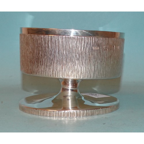 528 - Gerald Benney CBE, a circular pedestal-form bowl with glass liner and triple candle holder insert, t... 