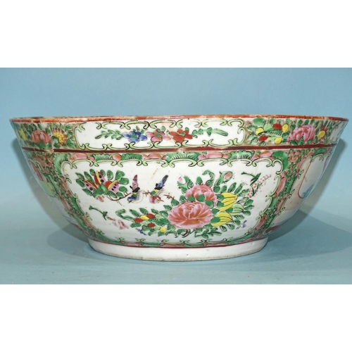 129 - A 19th century Canton bowl, typically-decorated with panels of figures, birds and flowers, 26cm diam... 