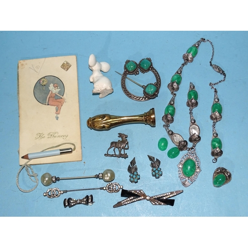 206 - A white metal Celtic penannular brooch set green hardstones and a small quantity of costume jeweller... 