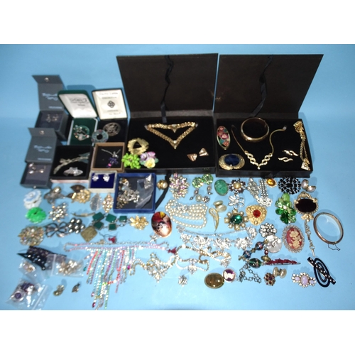 238 - A large quantity of vintage and later costume jewellery, (some boxed).