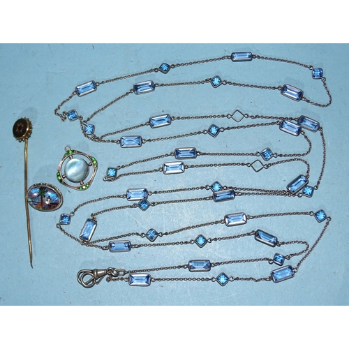 244 - A white metal guard chain, spectacle-set pale blue pastes at intervals, marked 