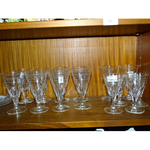 64 - A set of eight Victorian plain conical wine glasses, each with a band of etched decoration and other... 